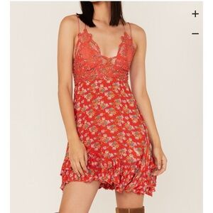 Free people Adela slip dress is orange with flowers